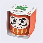 Una mini maceta muy original con un muñeco Daruma estampado