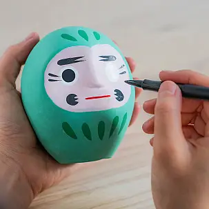 Figurita para pedir deseos daruma